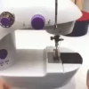 Mini máquina de coser eléctrica